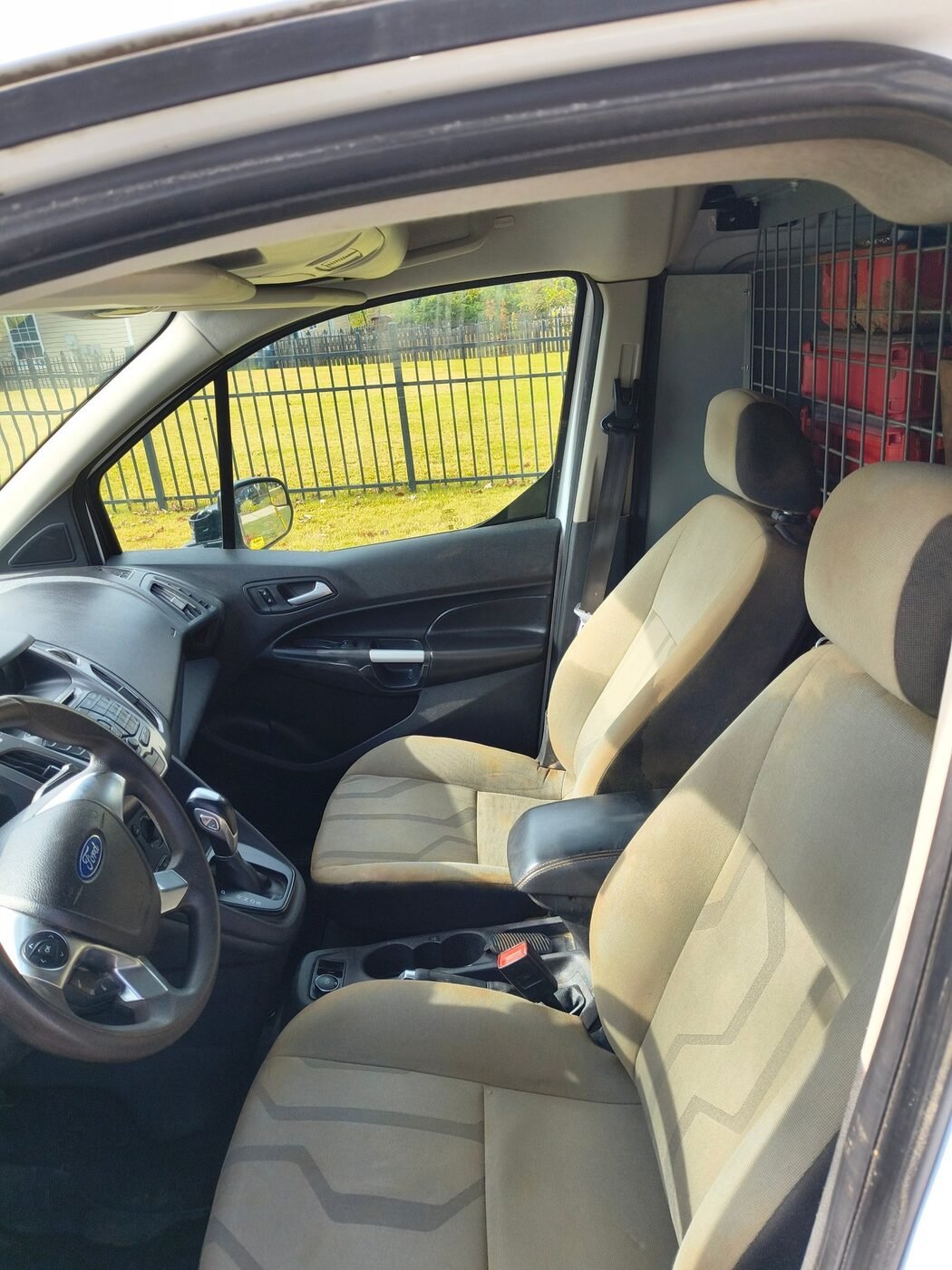 After: clean Ford Transit Connect work van cloth seats, cab and door panels following a Gleam Team interior detail in Charlotte and Raleigh NC