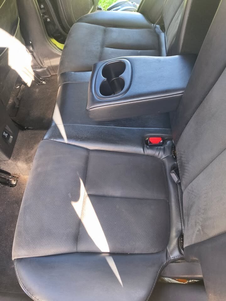 After: clean Mitsubishi SUV back seat and floor following a Gleam Team interior detail in Charlotte and Raleigh NC